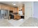 Well-equipped kitchen featuring stainless steel appliances and wooden cabinetry at 135 Meadow Lake Dr, Salisbury, NC 28146