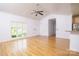 Bright living room features hardwood floors, vaulted ceilings, and a large window at 135 Meadow Lake Dr, Salisbury, NC 28146