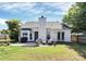 Picture of the home's backyard featuring a patio, lawn, and tidy landscaping at 13612 Bolingbrook Ln, Charlotte, NC 28273