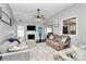 Spacious living room featuring a fireplace, vaulted ceilings, and comfortable seating at 13612 Bolingbrook Ln, Charlotte, NC 28273