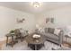 Bright living room with stylish furnishings and neutral color palette at 1422 Burnley Rd, Charlotte, NC 28210
