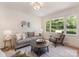 Comfortable living room with large windows offering natural light at 1422 Burnley Rd, Charlotte, NC 28210