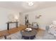 Cozy living room with hardwood floors and stylish décor at 1422 Burnley Rd, Charlotte, NC 28210