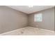 Modest bedroom with a window for natural light, painted gray, and carpeted floors at 154 Seven Oaks Ln, Statesville, NC 28677