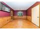 Cozy dining room with hardwood floors, wainscoting, and natural light at 154 Seven Oaks Ln, Statesville, NC 28677