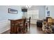 Cozy entertainment area with a wooden bar, seating, recessed lighting, and a wall-mounted TV at 16038 Harbor Hill Dr, Charlotte, NC 28273