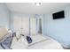 Bright bedroom with a large closet, a flat screen television, and a comfortable bed at 16038 Harbor Hill Dr, Charlotte, NC 28273