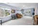 Spacious bonus room with two windows and comfortable seating at 16038 Harbor Hill Dr, Charlotte, NC 28273