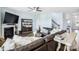 Open-concept living room seamlessly blends with a modern staircase and stylish decor at 16038 Harbor Hill Dr, Charlotte, NC 28273