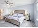 Bright main bedroom features a spacious layout, neutral colors, and cozy seating at 16038 Harbor Hill Dr, Charlotte, NC 28273