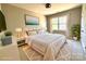 A beautifully staged bedroom features a queen-sized bed, stylish décor, and ample natural light at 16446 Doves Canyon Ln, Charlotte, NC 28278