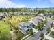 Stunning aerial view of a beautifully landscaped home and community with playground and green spaces at 17513 Julees Walk Ln, Davidson, NC 28036