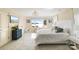 Bright bedroom with a water view, large windows, and a dresser at 17819 John Connor Rd, Cornelius, NC 28031