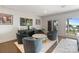 Open living area with a lake view, comfortable seating, and modern decor at 17819 John Connor Rd, Cornelius, NC 28031