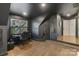 Office area featuring a desk setup, stylish decor, and a window view at 17819 John Connor Rd, Cornelius, NC 28031