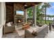 Cozy outdoor living space with stone fireplace and comfortable seating at 17819 John Connor Rd, Cornelius, NC 28031