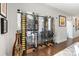 Custom glass wine rack with a capacity for hundreds of bottles of wine at 17819 John Connor Rd, Cornelius, NC 28031
