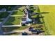 Aerial view of the property showcasing the backyard patio, outbuilding, and surrounding neighborhood at 179 Foy Ln, Statesville, NC 28625