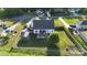 Wide angle view of a fenced backyard with patio, garden shed, and plenty of yard space at 179 Foy Ln, Statesville, NC 28625