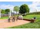 Lush backyard with a patio, outdoor grill and furniture, and a privacy fence at 179 Foy Ln, Statesville, NC 28625