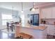 Bright kitchen featuring granite countertops, white cabinetry and stainless steel appliances at 179 Foy Ln, Statesville, NC 28625