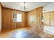 View of dining room with wood paneling and wooden floors at 191 Scenic Ne Dr, Concord, NC 28025
