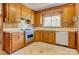 Kitchen features vintage appliances, cabinetry, and a window over the sink at 191 Scenic Ne Dr, Concord, NC 28025