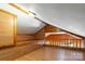 Open attic area featuring wood railing, paneled walls, with unique architectural details at 201 Trinity St, Clover, SC 29710