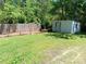 The home has a spacious backyard with a shed and deck at 201 Trinity St, Clover, SC 29710