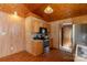 Functional kitchen with stainless steel appliances, wood cabinets, and hardwood floors at 201 Trinity St, Clover, SC 29710
