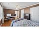 Bedroom with ceiling fan, wood floors, white doors, and desk with dual monitors at 202 Pond View Dr, Salisbury, NC 28147