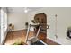 Bonus room featuring hardwood floors, ceiling fan, natural light and views of the main living areas at 202 Pond View Dr, Salisbury, NC 28147