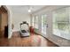 Bonus room featuring hardwood floors, ceiling fan, natural light and a sliding door to the outside at 202 Pond View Dr, Salisbury, NC 28147