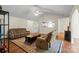 Inviting living room with vaulted ceiling, hardwood floors, comfortable leather seating and open floor plan at 202 Pond View Dr, Salisbury, NC 28147