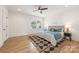 Bright bedroom with a ceiling fan and natural light at 2117 Roslyn Ave, Charlotte, NC 28208
