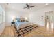 Bedroom featuring a ceiling fan and neutral decor at 2117 Roslyn Ave, Charlotte, NC 28208