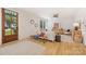 Inviting living room with light hardwood floors, contemporary furnishings, natural light, and a cozy atmosphere at 2117 Roslyn Ave, Charlotte, NC 28208