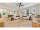 Bright living room with hardwood floors, large windows, recessed lighting, modern furniture, and stylish decor at 2117 Roslyn Ave, Charlotte, NC 28208