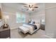 Inviting bedroom with a plush bed, neutral decor, and ample natural light at 2345 Sparrow Dr, Rock Hill, SC 29732