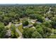An aerial view displays a neighborhood with lush trees, well-maintained lawns and scenic streets at 2410 Armstrong Park Dr, Gastonia, NC 28054