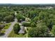 Aerial view highlighting the property's location with mature trees and neighborhood streets at 2410 Armstrong Park Dr, Gastonia, NC 28054