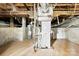 Unfinished basement utility area with water heater and HVAC unit at 2410 Armstrong Park Dr, Gastonia, NC 28054