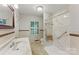 Bright bathroom featuring a walk-in shower with a seat and a window providing natural light at 2410 Armstrong Park Dr, Gastonia, NC 28054