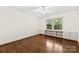 Bedroom with hardwood floors and built-in cabinets and shelving for additional storage at 2410 Armstrong Park Dr, Gastonia, NC 28054