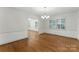 Elegant dining room with hardwood floors, connecting to other rooms with ample natural light at 2410 Armstrong Park Dr, Gastonia, NC 28054