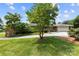 Beautiful brick home with a circular driveway and mature landscaping at 2410 Armstrong Park Dr, Gastonia, NC 28054