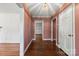 Hallway with hardwood floors and classic wallpaper at 2410 Armstrong Park Dr, Gastonia, NC 28054