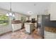 Charming kitchen with granite countertops, stainless steel appliances and a central island for food prep at 2410 Armstrong Park Dr, Gastonia, NC 28054