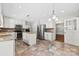 A bright eat-in kitchen features an island and stainless steel appliances at 2410 Armstrong Park Dr, Gastonia, NC 28054
