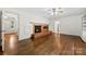 Living room with hardwood floors, fireplace and lots of light at 2410 Armstrong Park Dr, Gastonia, NC 28054